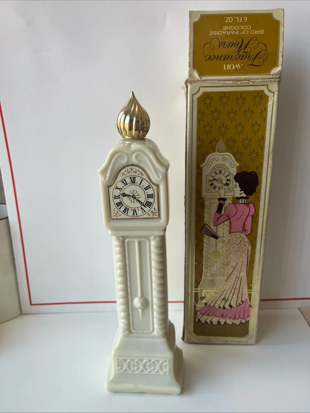 VTG Avon milk glass grandfather clock bird of paradise cologne fragrance hours